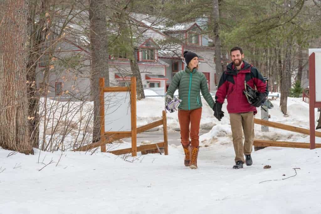 snowshoeing couple on a trail