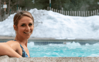 woman smiling in hot tub