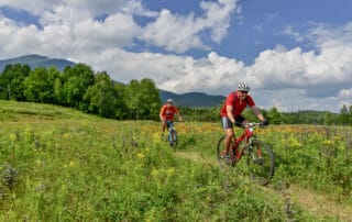 two people mountain biking at great glen trails