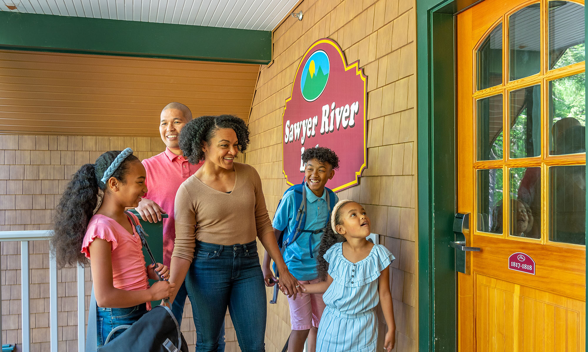 Family checking into sawyer river